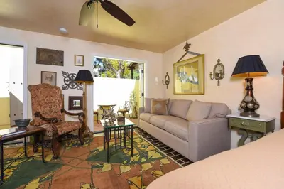 a living room with a couch and a chair at Hidden Casita with Private Deck & Patio in San Diego