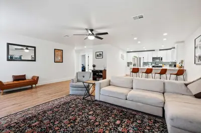 a living room with a couch and a table at Luxury Oasis Compound with Hot Tub with 3 Homes in Escondido