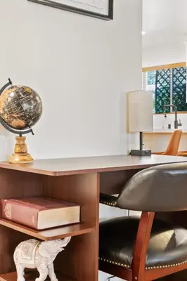 an office with a desk with a chair and a globe at Luxury Oasis Compound with Hot Tub with 3 Homes in Escondido