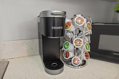 a keurig coffee dispenser next to a microwave at Prime North Park Stay, Walk to Restaurants, Bars, and Breweries with Free Parking in San Diego