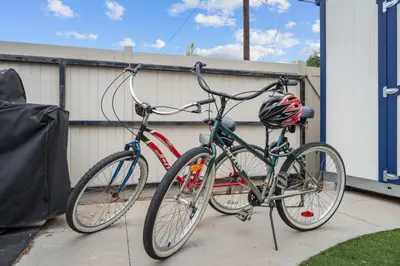 two bikes parked next to each other next to a building at Cozy Room with Hot Tub, Pool, Sauna & Gym Near Beach in Oceanside