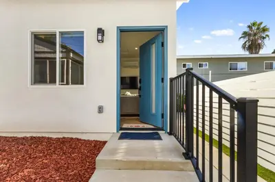 a door to a house with a blue door at Urban Villa in San Diego