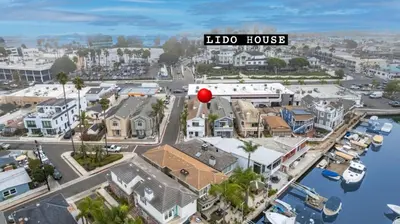 a rendering of a city with a red ball at 4 Car Parking Steps 2 Lido Village Marina Phenomenal Location in Newport Beach