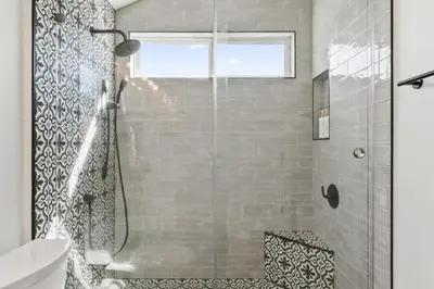a shower with a glass door in a bathroom at 4 Car Parking Steps 2 Lido Village Marina Phenomenal Location in Newport Beach