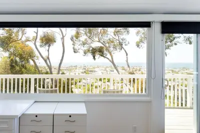 a room with a window with a view of the ocean at Seaview craftsman with Amazing views in San Diego