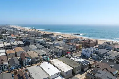 an aerial view of a city and the beach at Salt & Sand II in Newport Beach