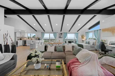 a living room with a couch and a table at Entire Private Home with 2 Bedrooms 1 Bathroom, Grand View, King Bed, Spacious, Parking, Available Now in El Cajon