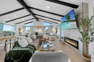 a living room with a couch and a fireplace at Entire Private Home with 2 Bedrooms 1 Bathroom, Grand View, King Bed, Spacious, Parking, Available Now in El Cajon