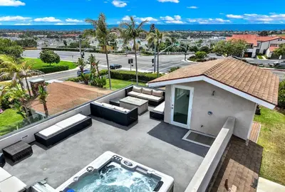 an aerial view of a house with a swimming pool at Oceanview Oasis with Roofdeck Hot Tub in Carlsbad