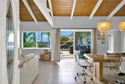 a dining room with a wooden ceiling and a table at Oceanview Oasis with Roofdeck Hot Tub in Carlsbad