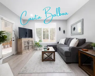 a living room with a couch and a tv at Casita Balboa Modern 1 BR close to Balboa Park in San Diego