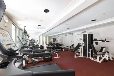 a gym with several treadmills and cardio machines at Casita Balboa Modern 1 BR close to Balboa Park in San Diego