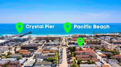 a city with green descriptions of a beach at Walk to beach Prime location Villa in San Diego