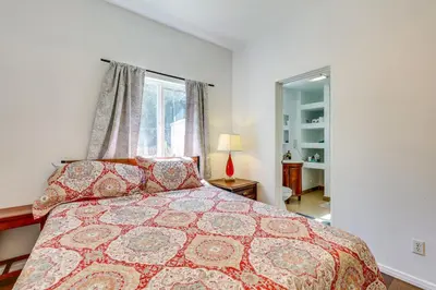 a bedroom with a bed and a window at 4 Mi to Lake Elsinore Pet-Friendly Adventure Base in Lake Elsinore