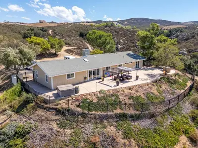 an aerial view of a house in the hills at Hilltop Getaway with Sunset Views in Temecula