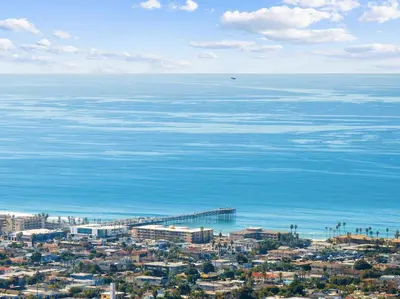 an aerial view of a city and the ocean at PB Ocean Views - Garage, Parking, King Bed in San Diego