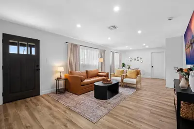 a living room with a couch and two chairs at NEW! Hot TubPoolFire Pit10 Mins to Beach in San Diego