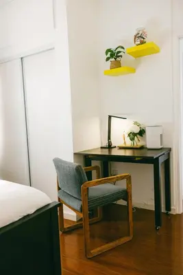 a bedroom with a desk and a chair next to a bed at Mira Mesa Private Suite with Private Bath & Entry #1 in San Diego