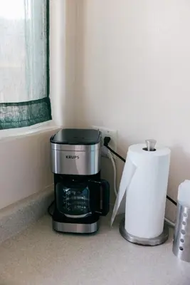 a coffee maker and a roll of paper towels at Mira Mesa Private Suite with Private Bath & Entry #1 in San Diego