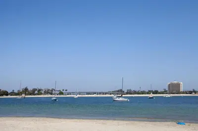 a group of boats in the water on a beach at Relaxing Beach Bungalow in San Diego