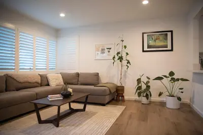 a living room with a couch and a table at The Atlas in San Diego