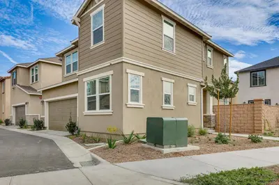 a house with a green mailbox in front of it at Near Hospitals Home with Pool Access in Temecula in Temecula