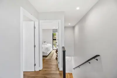 a hallway leading to a bedroom in a house at Designer Canyon House in La Jolla in San Diego