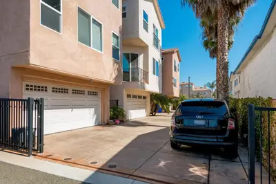 a car parked in front of a house at Oceanview Beach Home - 209W in Oceanside