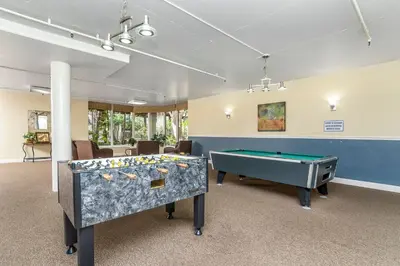 a room with two ping pong tables in it at North Coast Village B212 in Oceanside