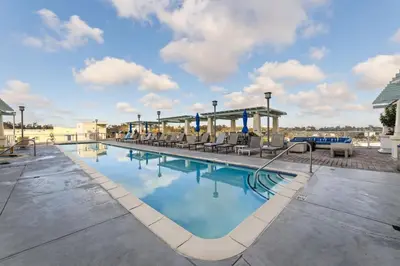 a swimming pool on the roof of a building at 3BR Downtown Peaceful Corner in San Diego