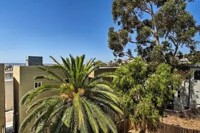a palm tree in front of a building at Apt in San Diego in San Diego