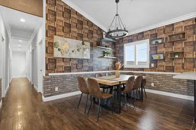 a dining room with a wooden table and chairs at Spacious 3BR Home with Pool in La Mesa