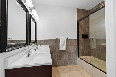 a bathroom with a sink and a shower at Spacious 3BR Home with Pool in La Mesa