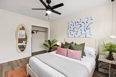 a bedroom with a bed and a ceiling fan at Pacific Beach Paradise-Walk to Beach &Bay in San Diego
