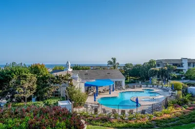 an aerial view of a swimming pool at a resort at Newport Beach Lux in Newport Beach