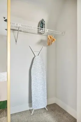 a room with a shelf and a surfboard on a wall at Modern 1BD in La Jolla Mountain City Views Free Parking in San Diego