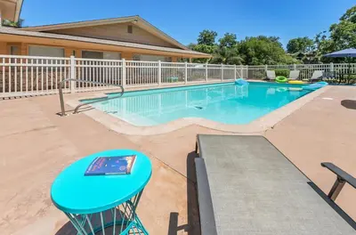 a swimming pool with a blue table in front of a house at Serene 4BR La Mesa Hideaway in La Mesa