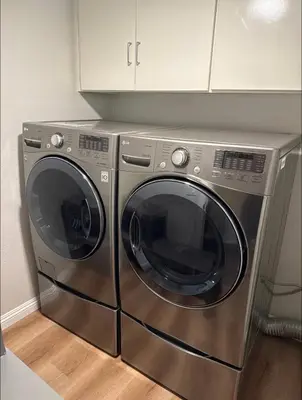 a stainless steel washer and dryer in a kitchen at Nice home in Irvine