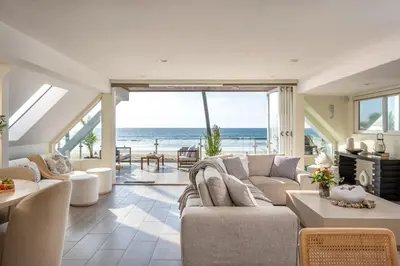 a living room with a view of the ocean at Casa Azul at Mission Beach Oceanfront Getaway in San Diego