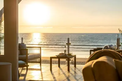a living room with a view of the ocean at Casa Azul at Mission Beach Oceanfront Getaway in San Diego