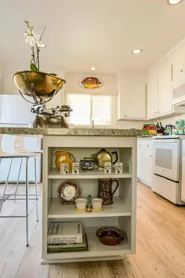a kitchen with a counter with a bowl on top at 2 Bdr 2 bath luxury home steps away from Mission Beach 5 min from Belmont in San Diego