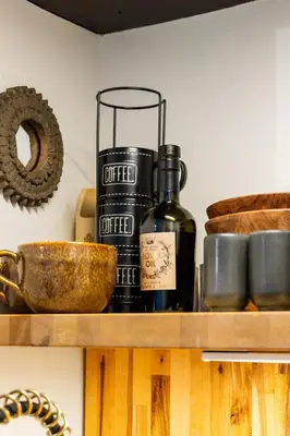 a bottle of wine sitting on a shelf at La Jolla Studio - Private Beach in San Diego