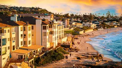 a view of a beach with buildings and the ocean at La Jolla Studio - Private Beach in San Diego