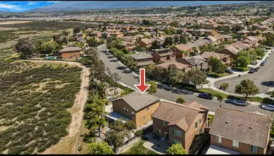 an aerial view of a house with a red arrow at Your Home Away From Home near Wineries & Old Town in Murrieta