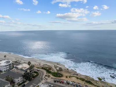 an aerial view of the beach and the ocean at Ocean Paradise | Patio, Parking, BBQ, Location! in San Diego