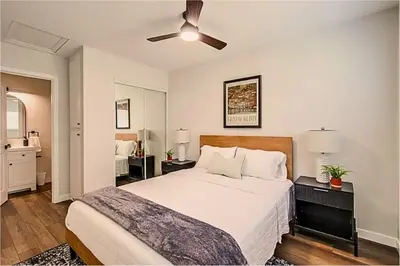 a bedroom with a bed and a ceiling fan at 1BR Close to Downtown SD, Beaches and North Park 1 in San Diego