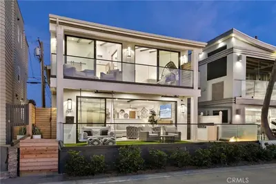 a large house with a lot of windows at Beachfront Sunset in San Diego