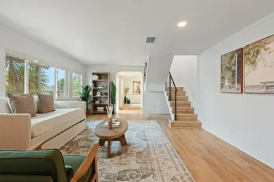 a living room with a couch and a table at Villa Tierra Alta - Pool, Spa, Movie Theater, Game Room in La Mesa