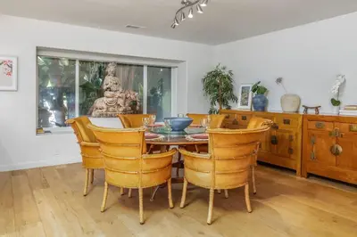 a dining room with a table and chairs at Carlsbad Zen - Large Pool in Carlsbad