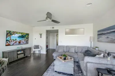 a living room with a couch and a table at Marina Del Mar 203A in Oceanside